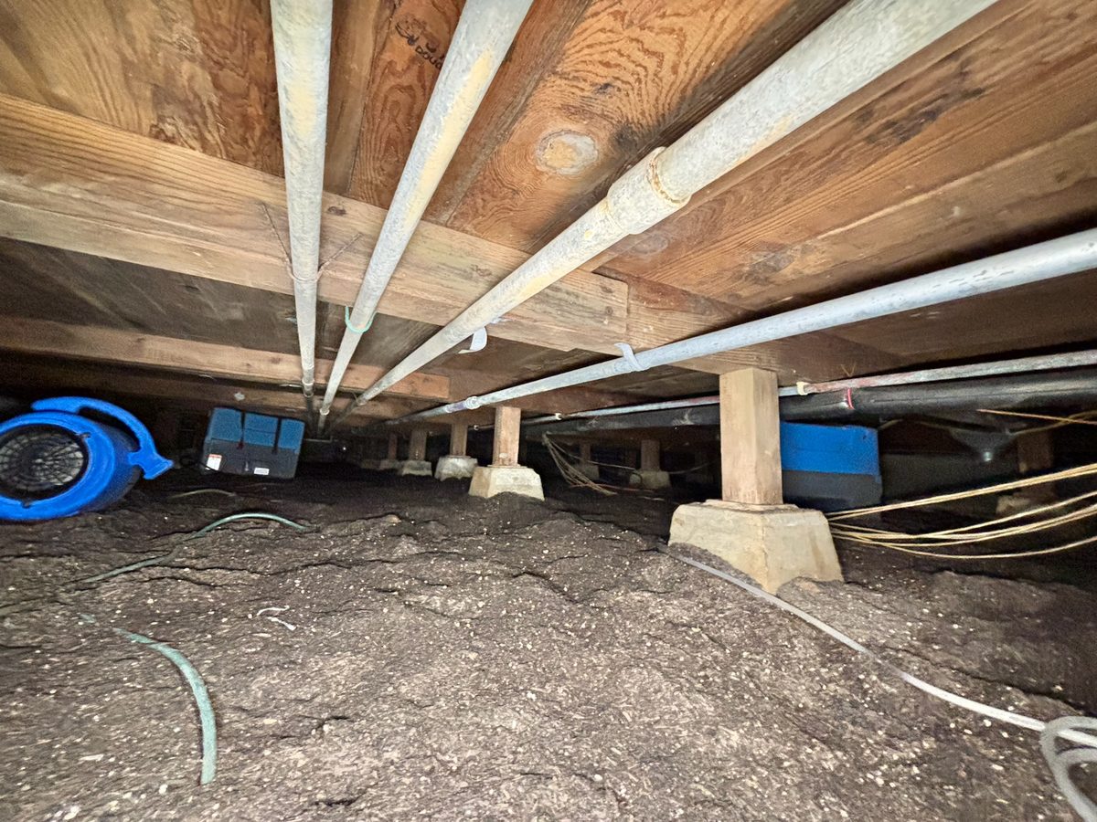 Drying equipment in a flooded crawlspace
